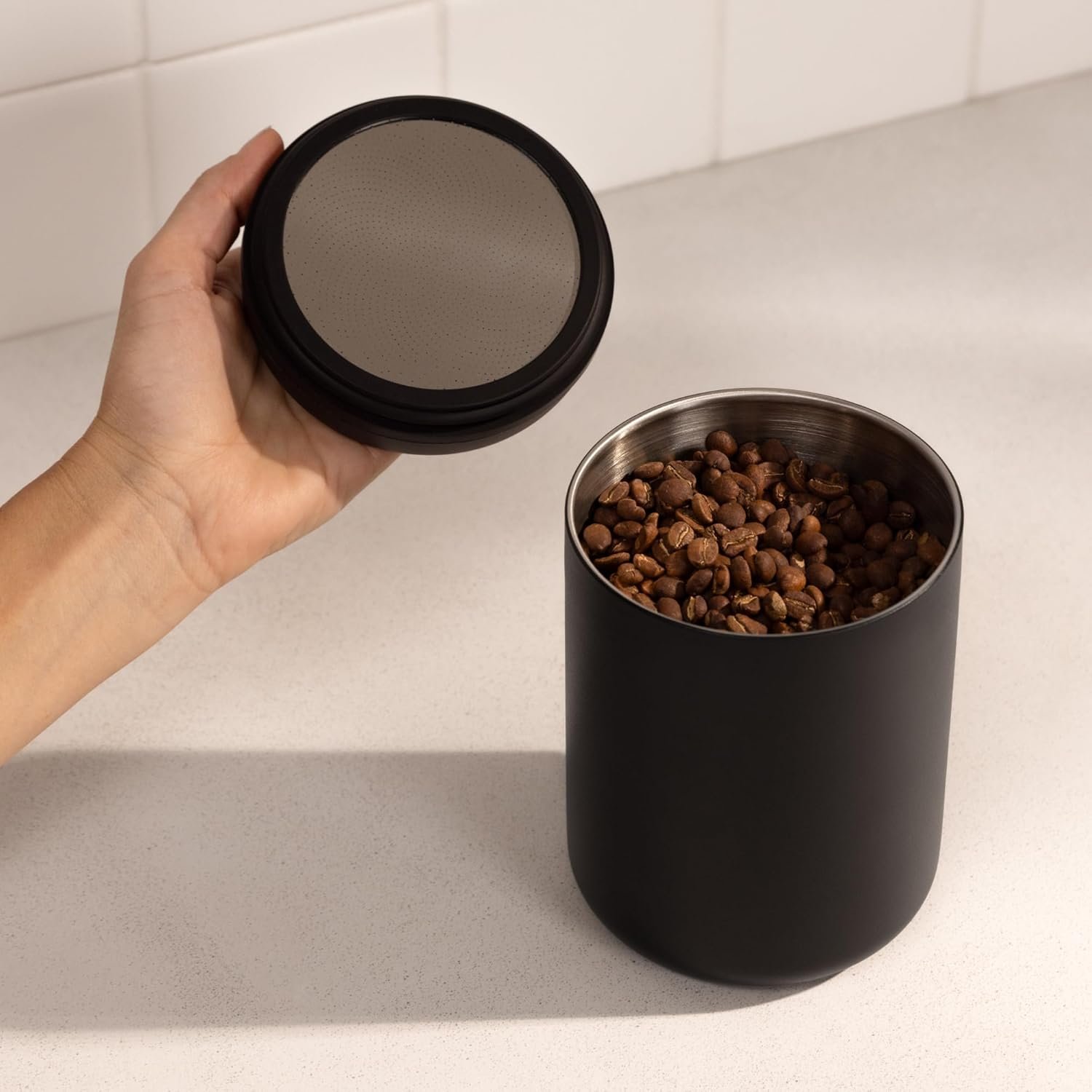 Vacuum sealed coffee canister